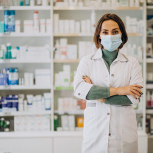 Young woman pharmacist at pharmacy